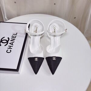 CHANEL Elegant Black and White Heels